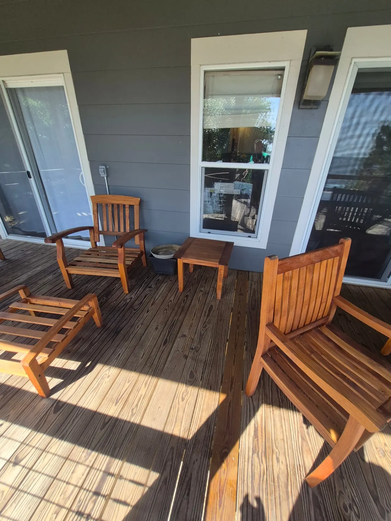 Lakefront Teak Restoration — Weathered patio furniture refinished with protective oil