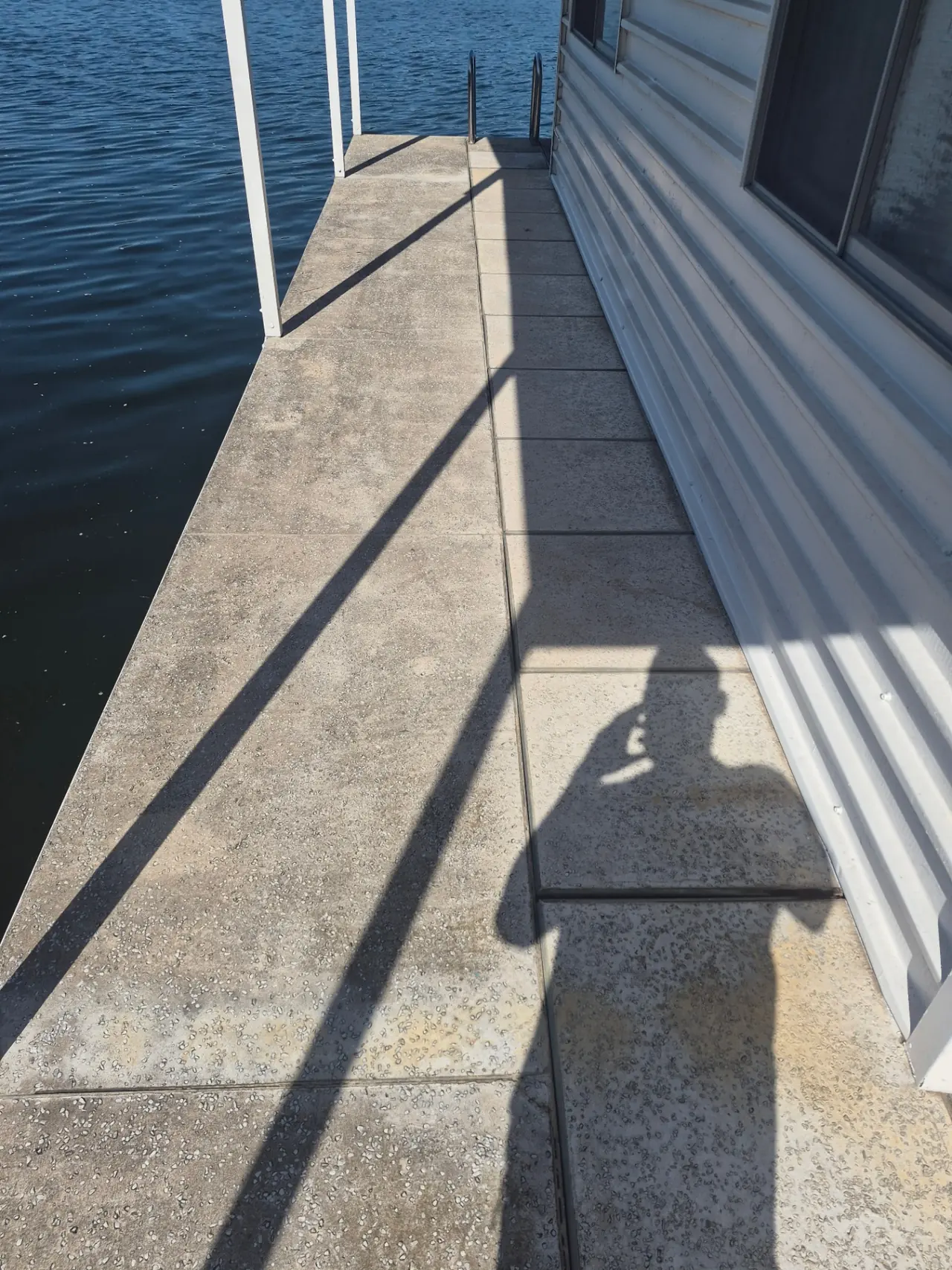 Boathouse & Walkway Restoration — Mildew removal on concrete, siding, and dock ceilings